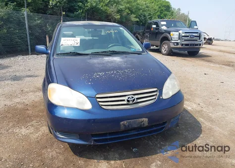 2003 Toyota Corolla Le z USA, uszkodzony, nr VIN 2T1BR38E53C159171